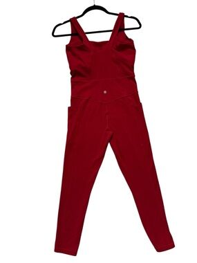 NWOT Athleta Red Salutation One Piece Bodysuit Medium Yoga Jumpsuit Built In Bra